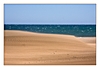 durch einen Sandsturm getrübter Blick aufs Meer